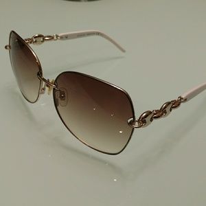 Light brown round frame women sunglasses by Gucci